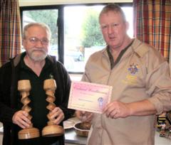 The Highly commended Bob Mann received his certificate from Tony Handford